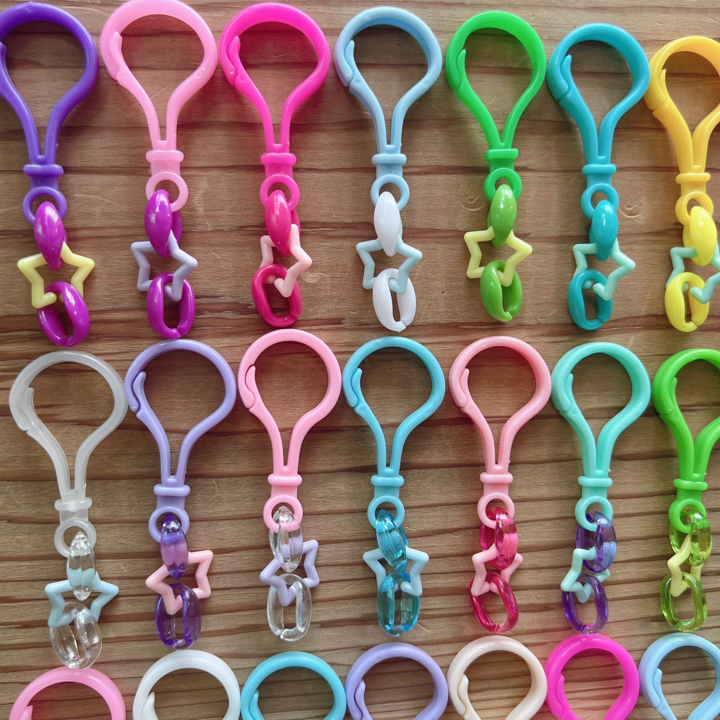 234 星チェーン おまかせ100個セット キャンディバッグキーホルダー ハンドメイド ガチャ詰めポーチ ワークショップ 材料 ハトメがカラーです♡