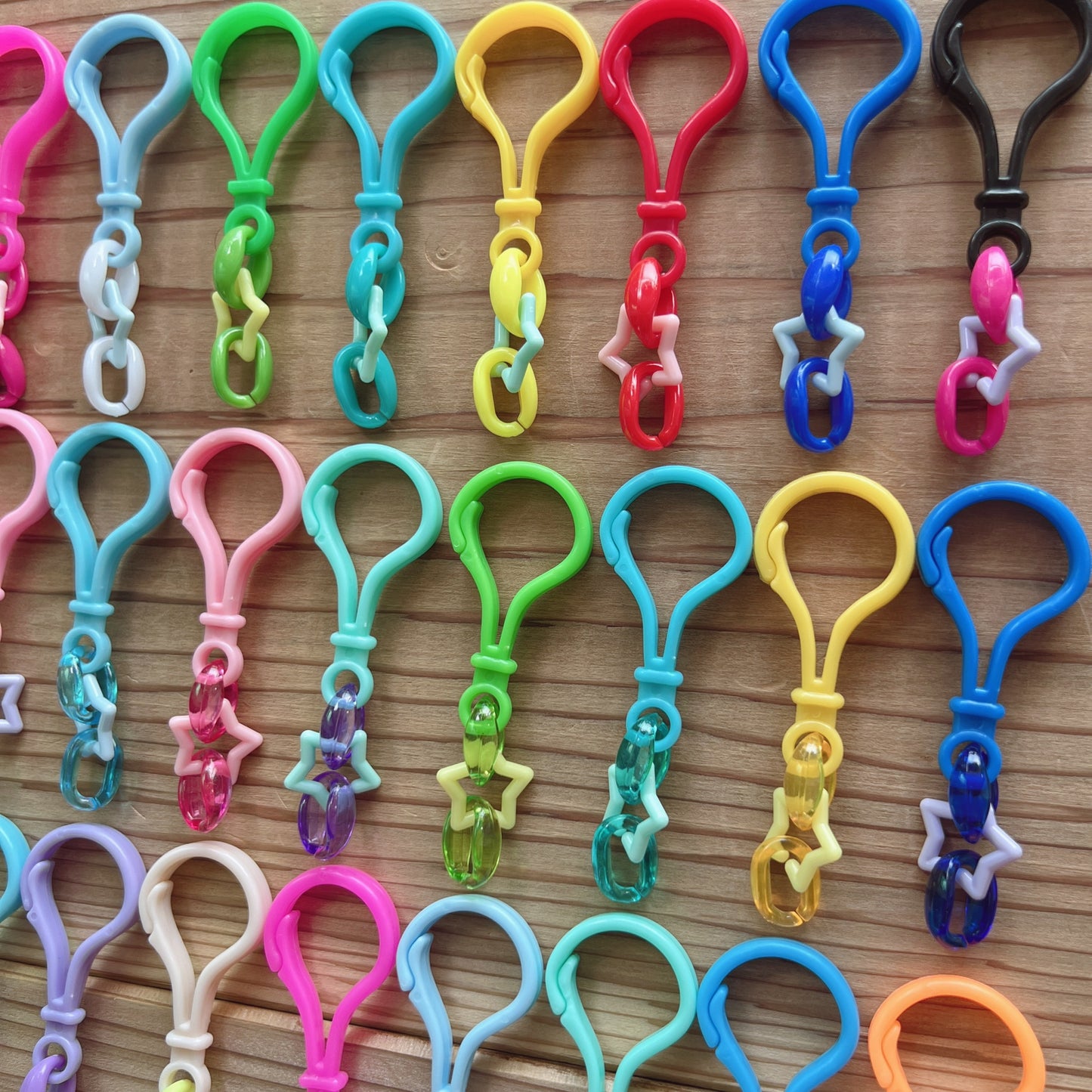 234 星チェーン おまかせ100個セット キャンディバッグキーホルダー ハンドメイド ガチャ詰めポーチ ワークショップ 材料 ハトメがカラーです♡